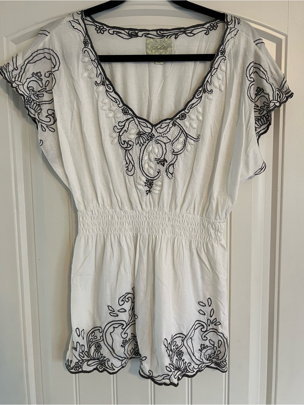 Deletta White Top with Black/Gray Embroidery Accents and Smocked Waist